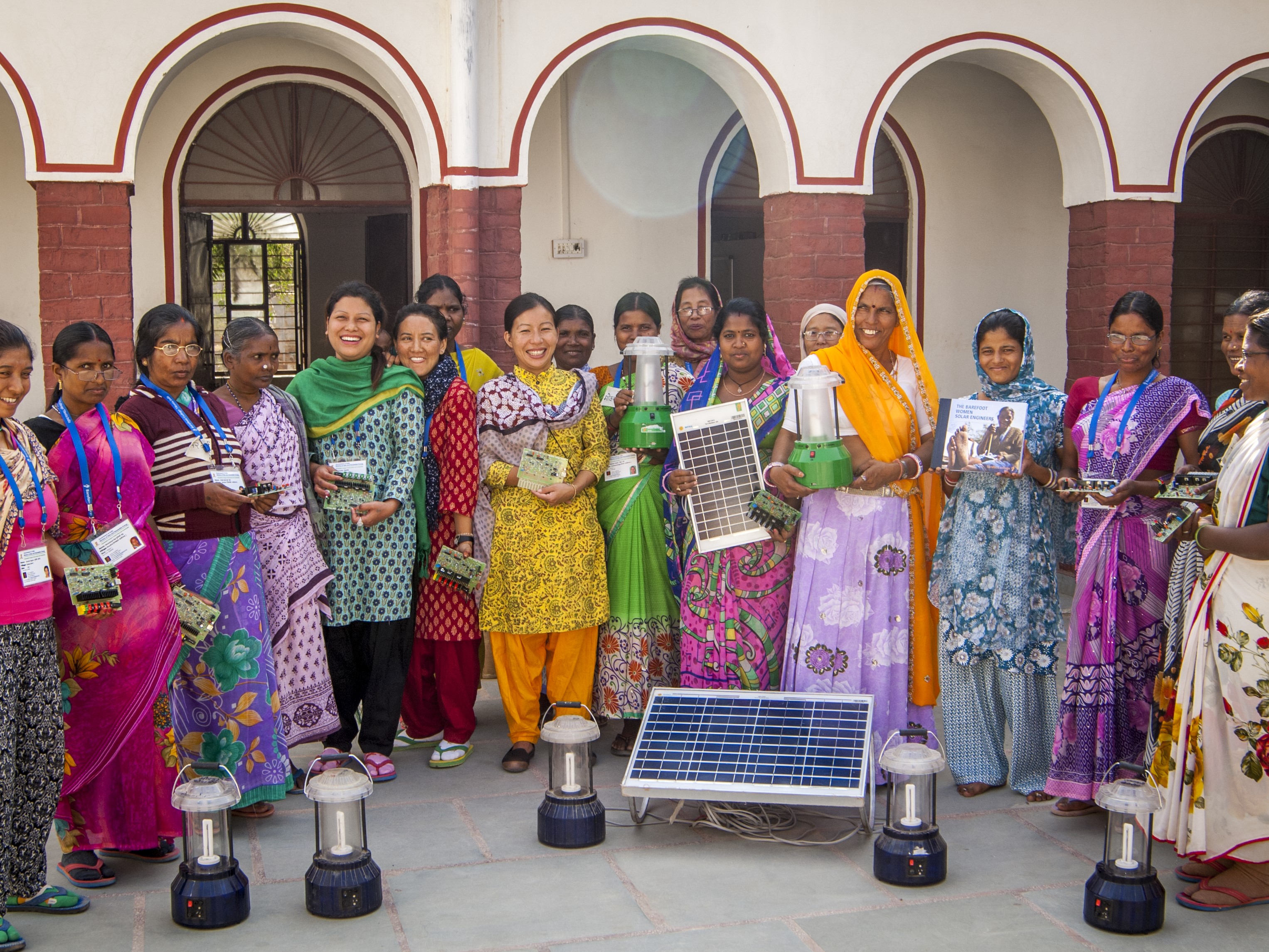 Group of smiling women entrepeneurs of the Coca-Cola 5by20 program 